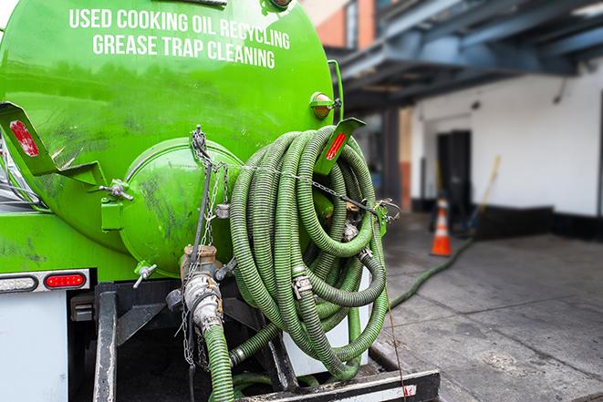 a large grease trap being pumped by a specialist in Donegal PA